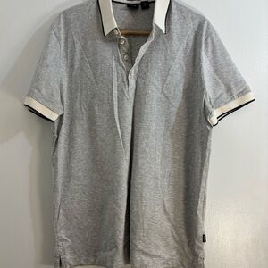 Men’s Grey Hugo Boss Polo Shirt Featuring Contrasting Collar and Cuff Accents.